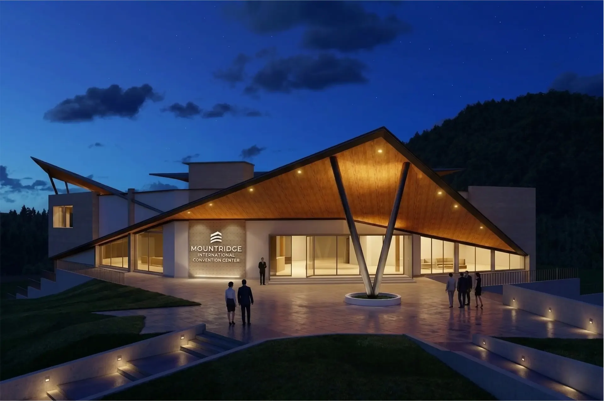 Mountridge International Convention Centre in Manjeri, Kerala illuminated at night, its timber pavilion glowing beneath the mountain horizon